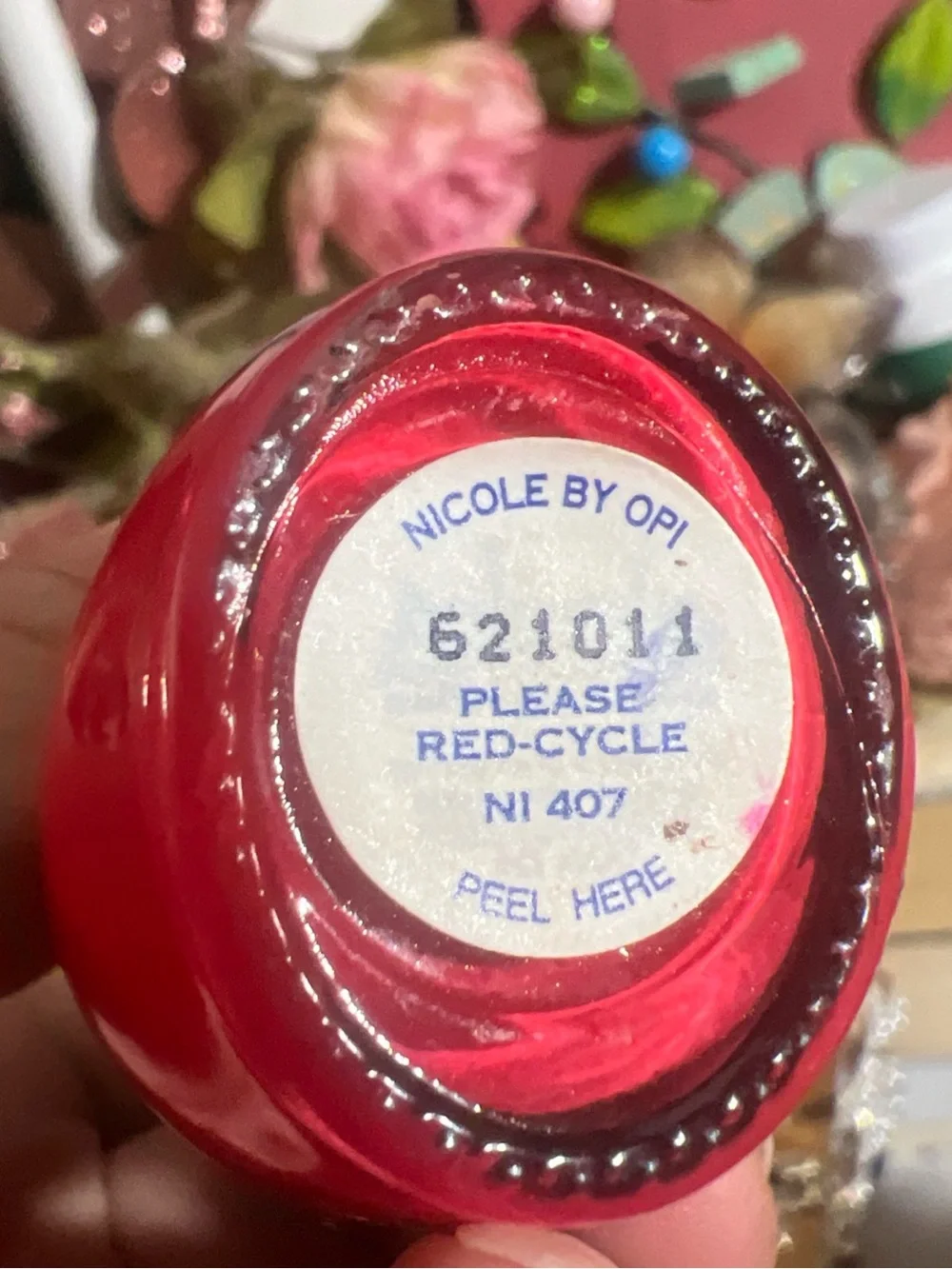 OPI Nicole by OPI “Please red-cycle in 407 in apple red